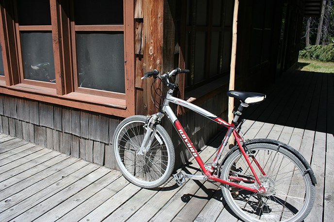 A bike is parked outside the Hozomeen staff housing complex. Image Credit: NPS/NOCA
