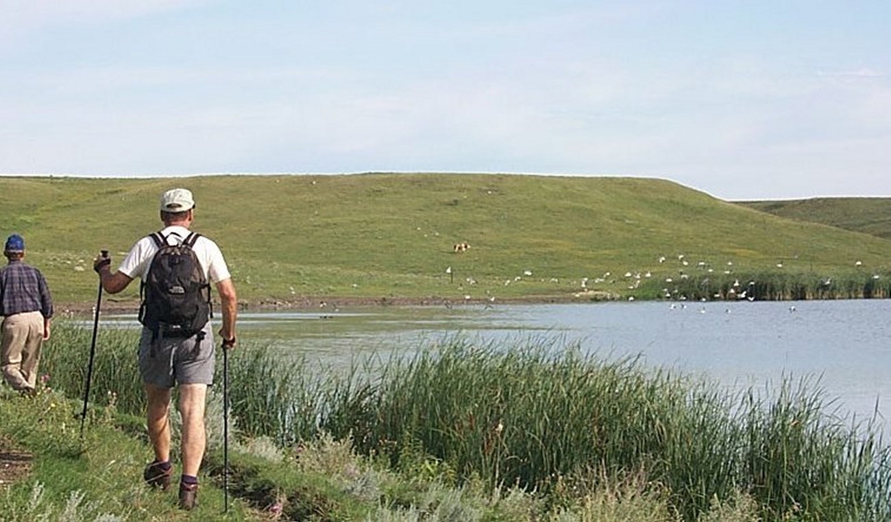 A Hiker along the shore of Lake Ashtabula, North Dakota