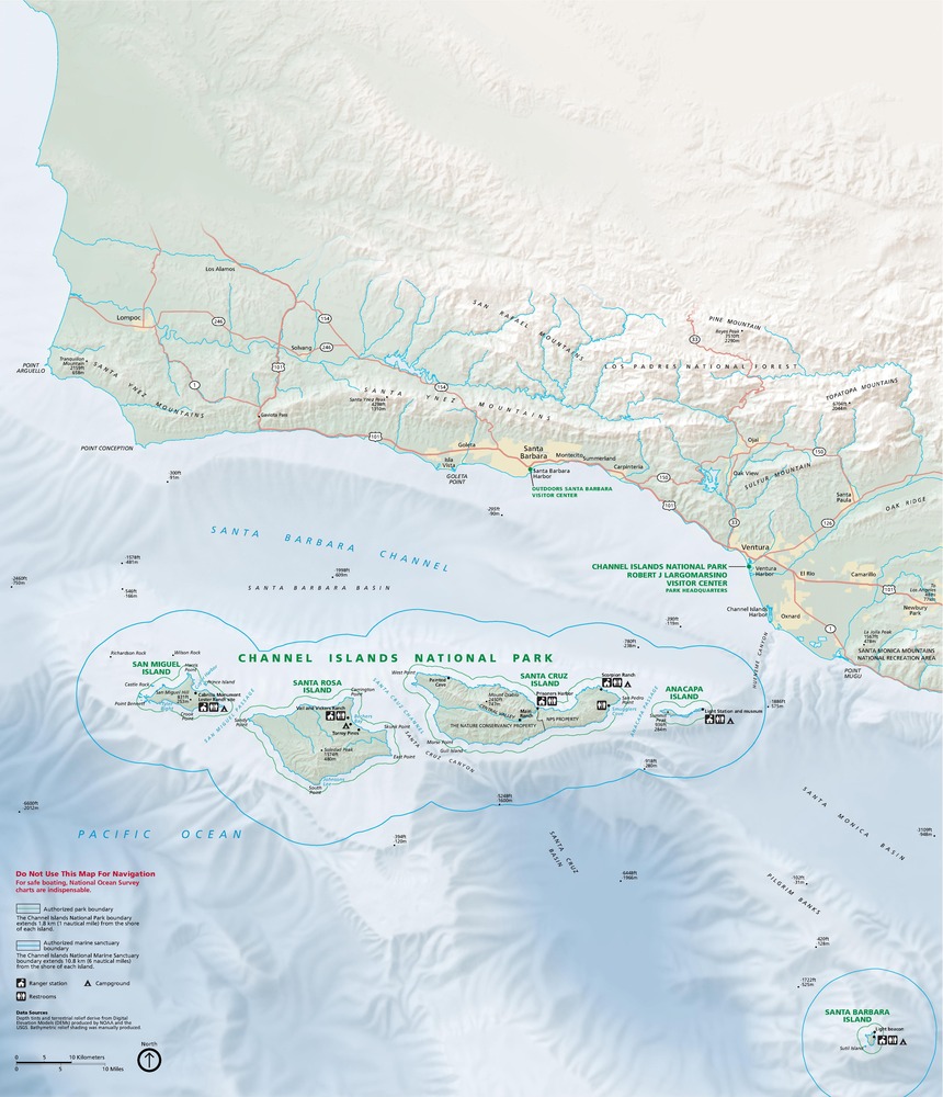 Map of Channel Islands National Park, a series of five islands flanked to the north by Santa Barbara Channel and the Pacific Ocean to the south. A strip of continental California takes up almost the top half of the map. The islands and coastal areas are green. The water is blue shaded to indicate underwater terrain.