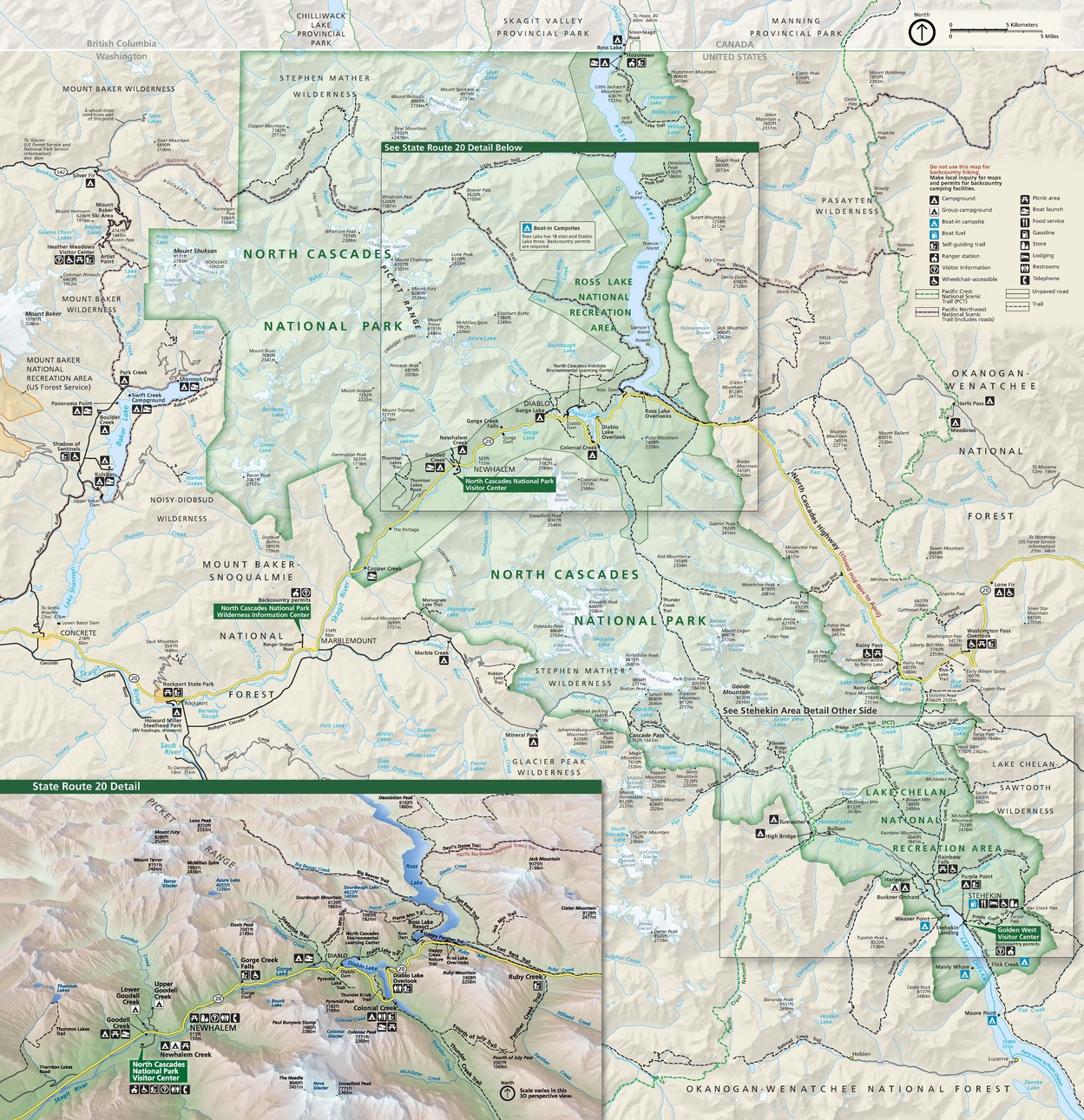 Map of North Cascades National Park in Washington. Park areas are shaded light green, national recreation areas are darker green, and outlying areas are tan. Scores of sites, peaks, and bodies of water are labeled across the map.