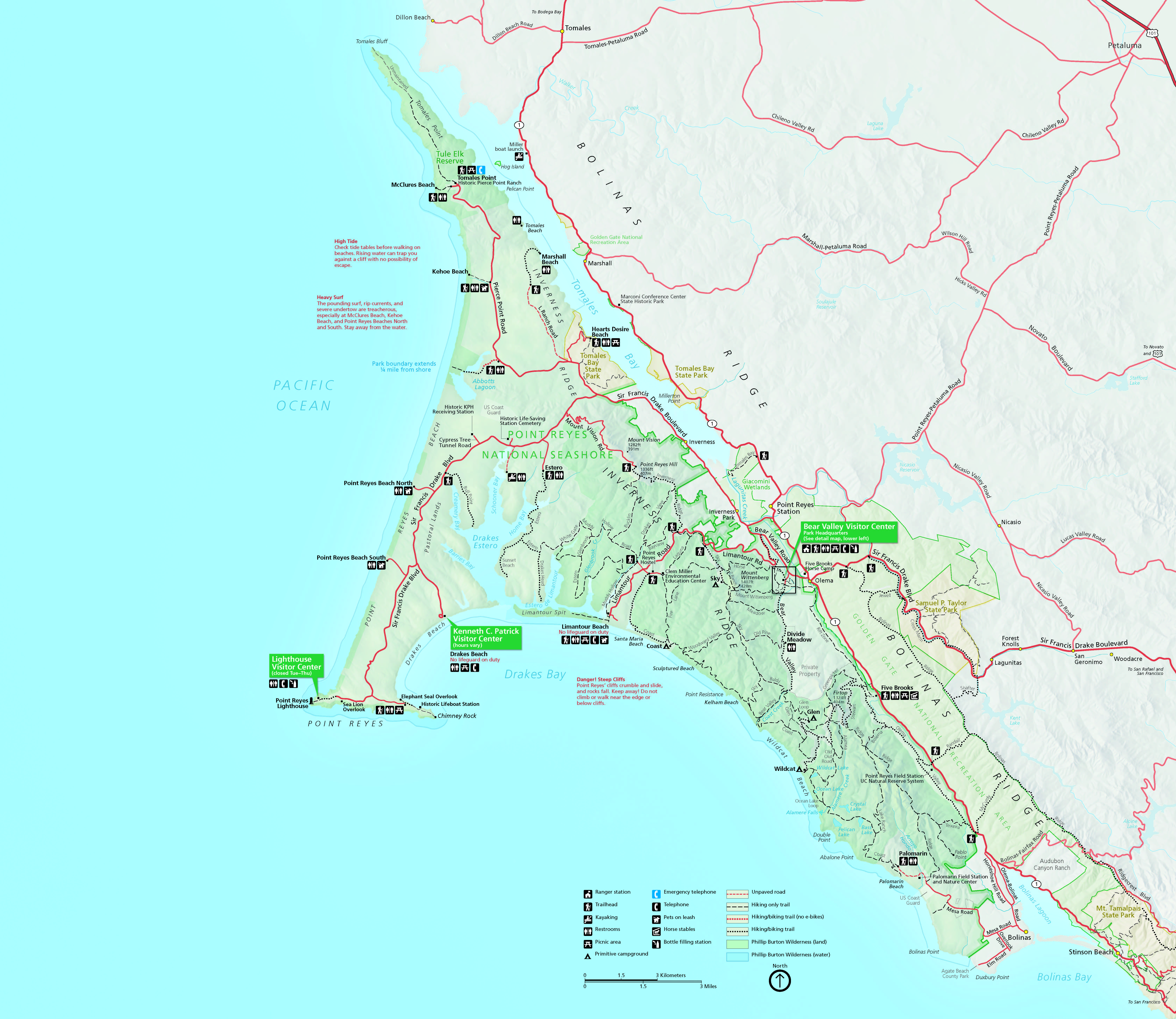 Map of Point Reyes National Seashore in California. The map shows a tapering green peninsula jutting into the blue Pacific Ocean off of a tan land mass.