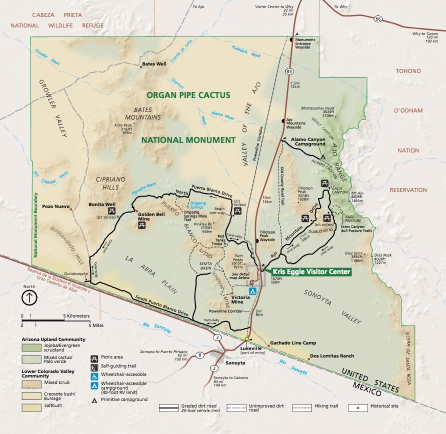Map of Organ Pipe Cactus National Monument in Arizona. This trapezoidal park shows the topography in shades of green and brown. The areas outside the park boundary are pale tan.