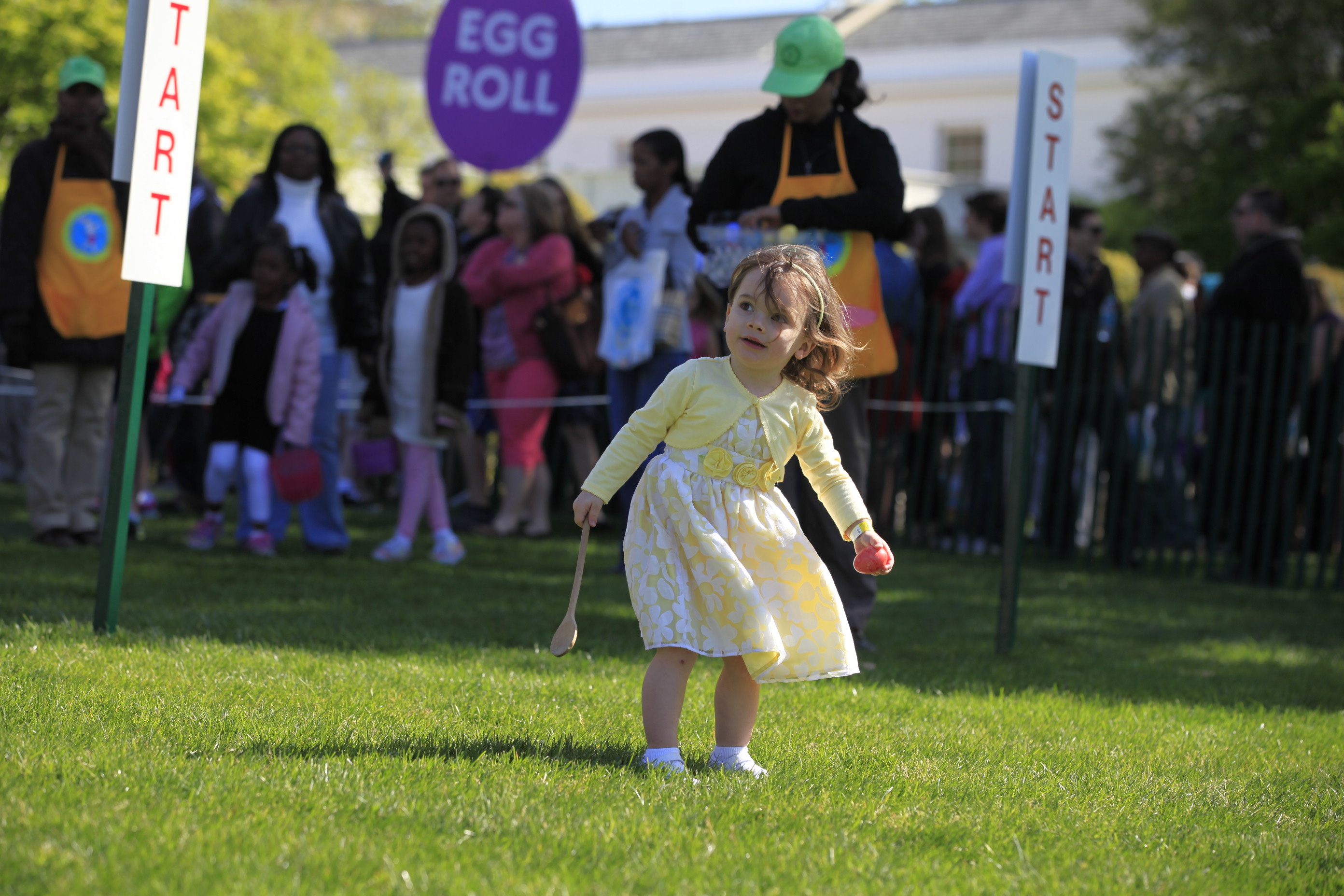 A young girls participates in the Egg Roll. 