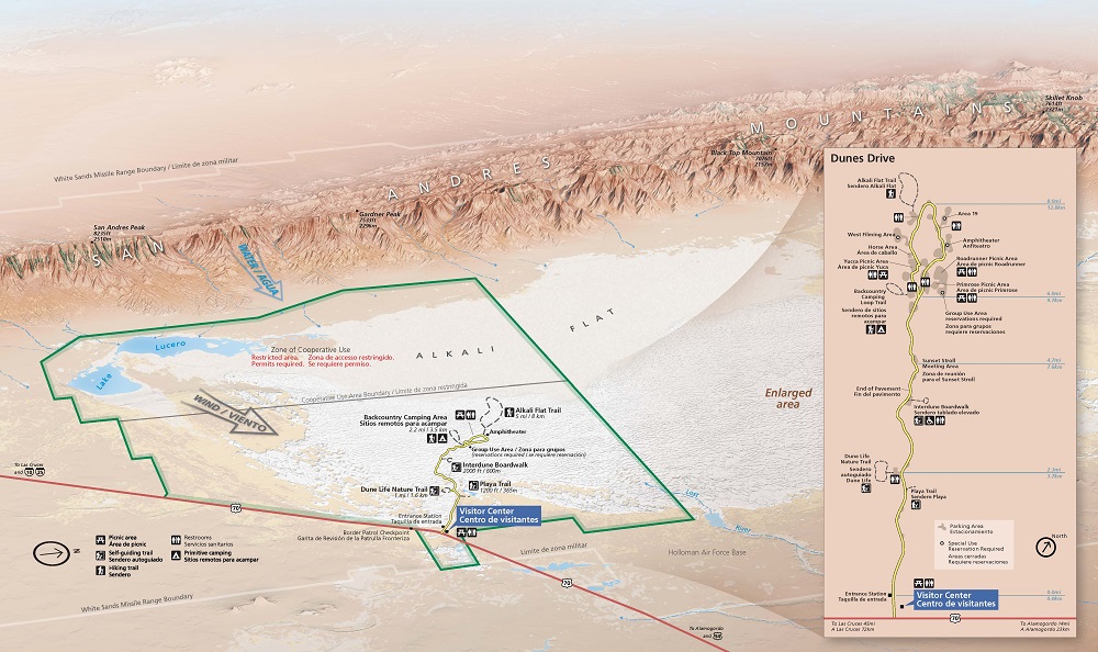 Bird’s-eye view looking across White Sands National Park in New Mexico. The park is outlined in green with the surrounding area in beige with sand dunes in white. An inset diagram to the right maps sites along Dunes Drive.