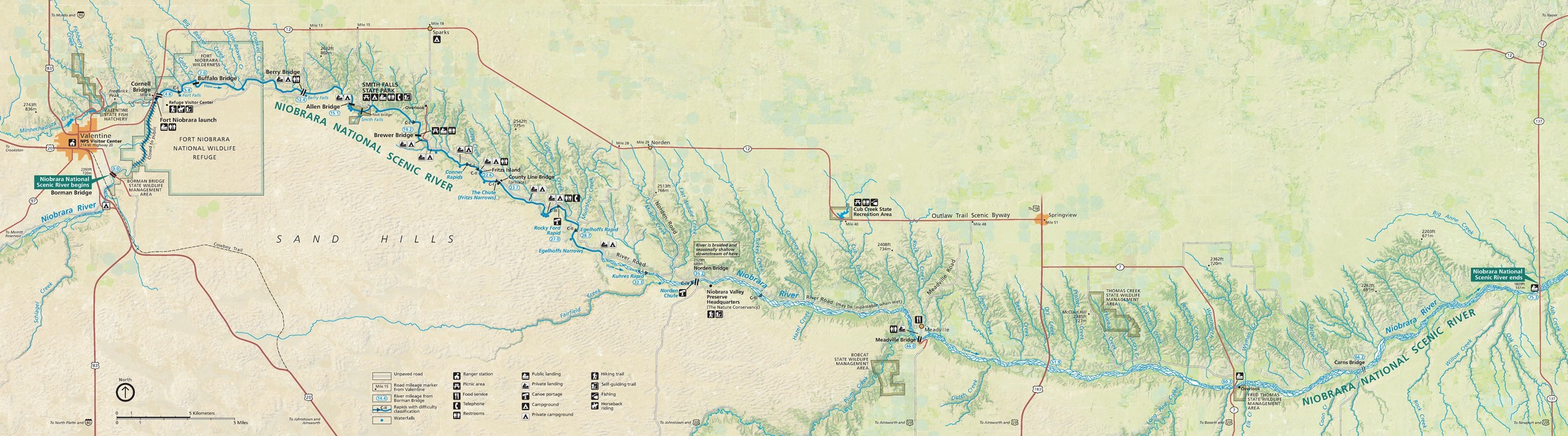 Map of Niobrara National Scenic River in north-central Nebraska. The river is denoted by a thick blue line that runs east-west in a shallow, sideways S shape. Multiple creeks branch off the main river as smaller blue lines.