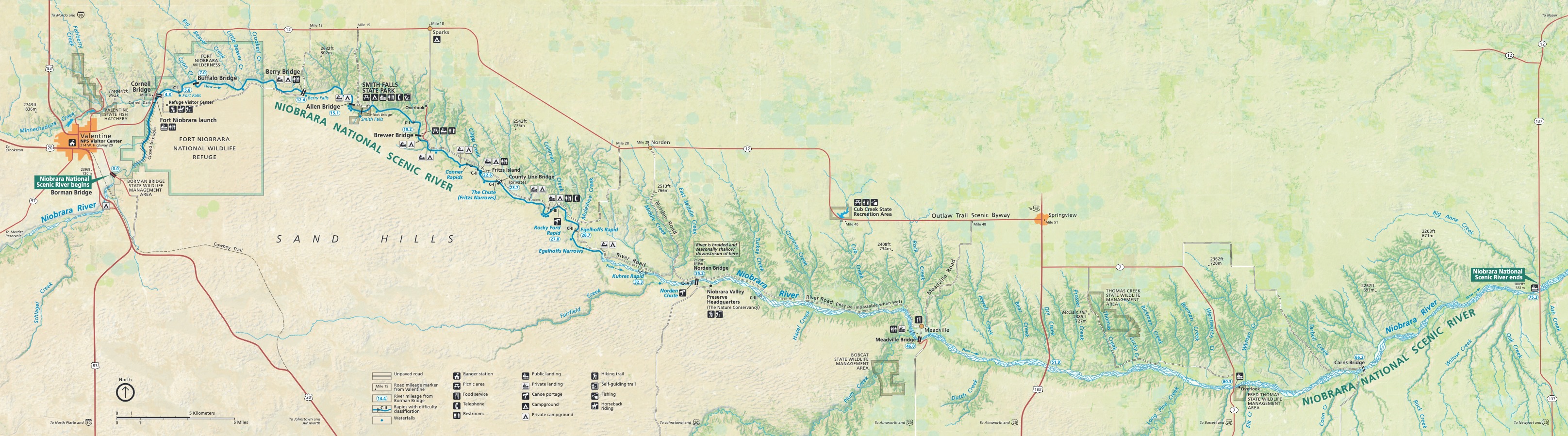 Map of Niobrara National Scenic River in north-central Nebraska. The river is denoted by a thick blue line that runs east-west in a shallow, sideways S shape. Multiple creeks branch off the main river as smaller blue lines.