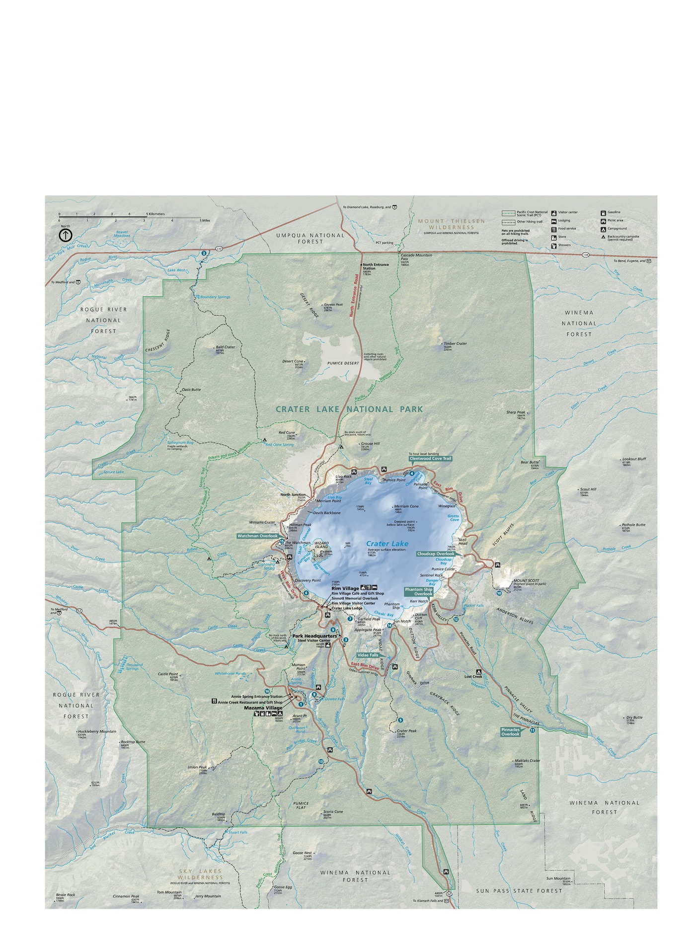 Map of Crater Lake National Park in Oregon. The boundaries of the mostly rectangular park are outlined in green, and the land inside the park is green, a shade darker than the surrounding land. Blue rivers fan out from all sides around the circular, sky-blue Crater Lake in the middle of the park.