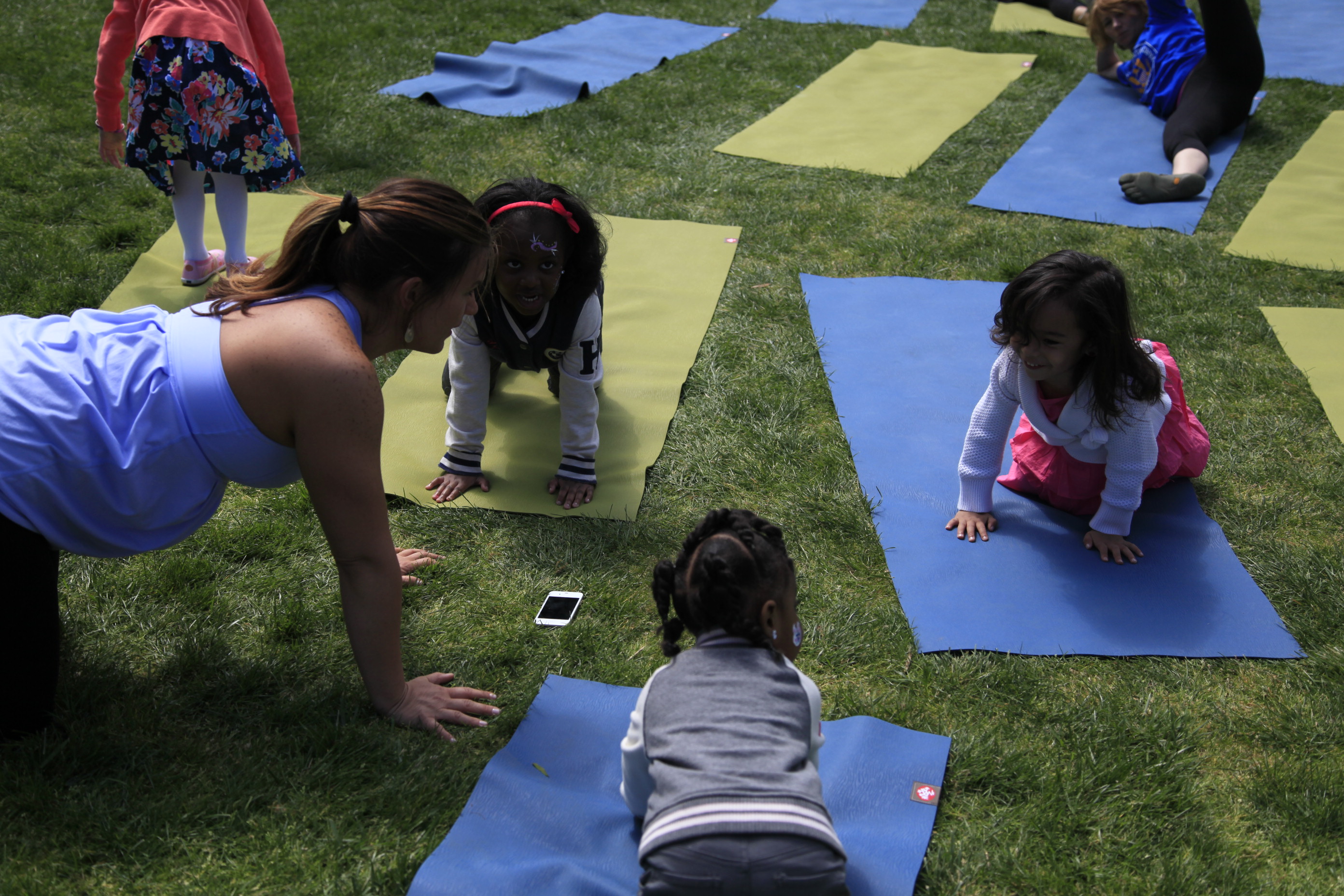 Children learn yoga poses at the 2012 Easter Egg Roll.