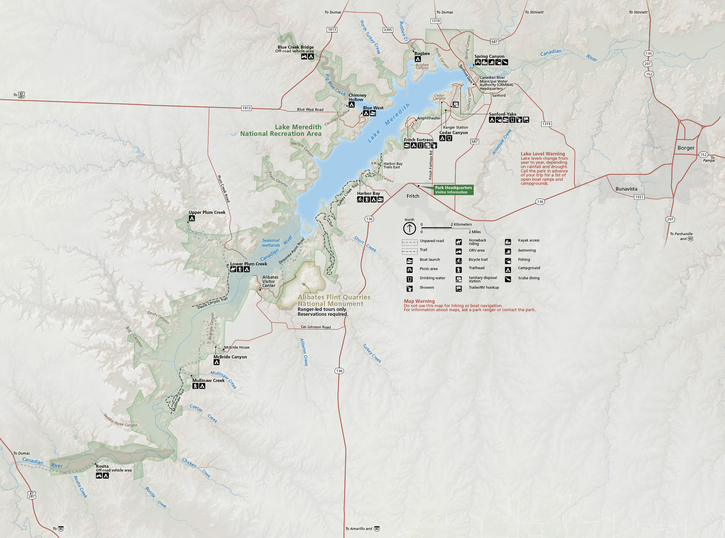 Map of Lake Meredith National Recreation Area in Texas. The park area is shown in green, the lake and the Canadian River in blue, roads as red lines, and other terrain in beige.