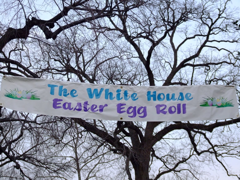 A welcome banner reads "The White House Easter Egg Roll" 