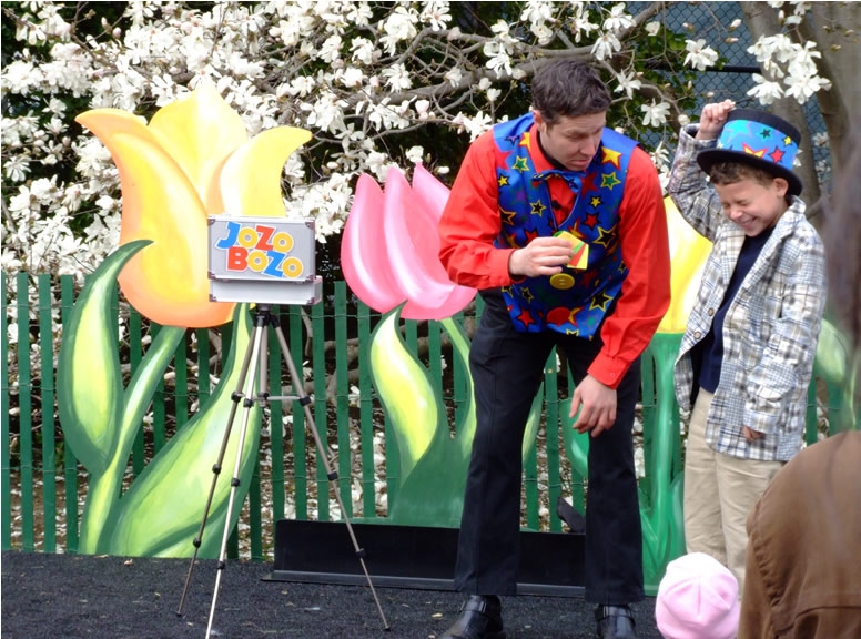Magician Jozo Bozo performs a magic trick on the South Lawn of the White House.
