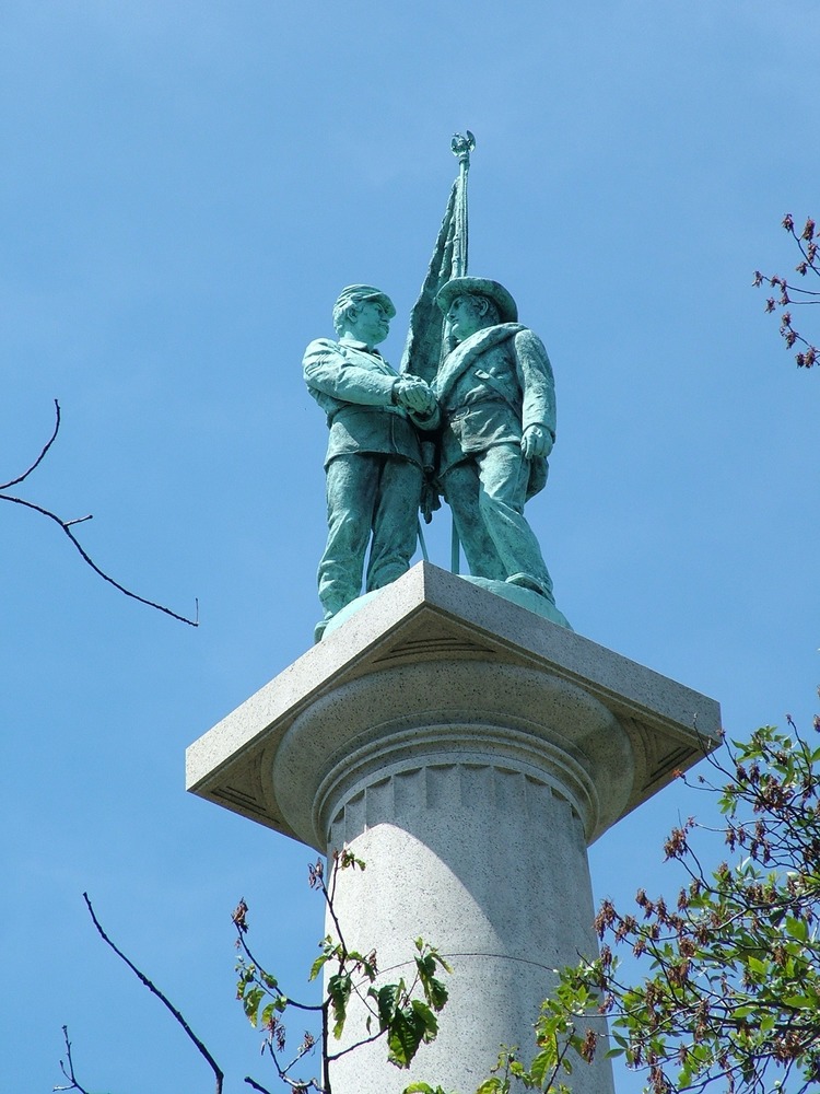 The New York Peace Monument located on Lookout Mountain features a Confederate and Union soldier shaking hands on the top.