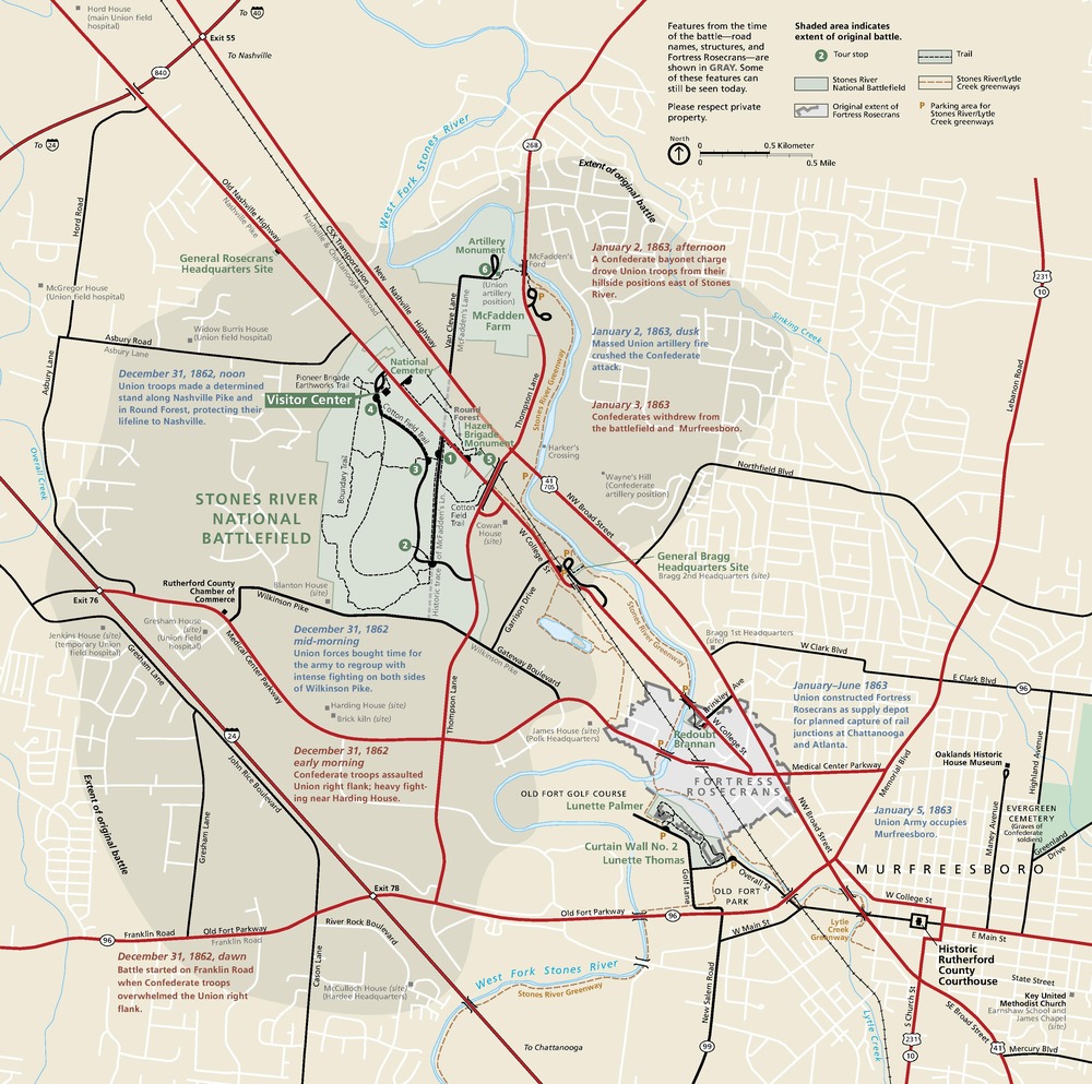 Map of Stones River National Battlefield in Tennessee. The park is relatively small and pale green within a larger tan, roughly bean-shaped, vertically oriented area on the left half of the map. Surrounding areas are pale yellow, highways are shown as red lines, and named roads indicated with black lines.