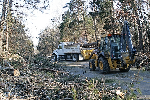 Crews clear downed trees from Green River Ferry Road North after the January 2009 ice storm.