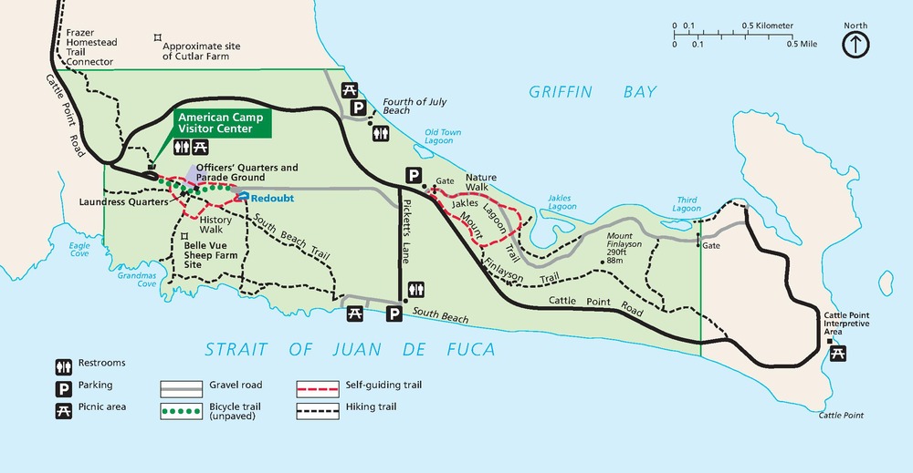 Map of the American camp in San Juan Island National Historical Park in Washington. The park stretches most of the length of a long peninsula. It is shaded green, and other areas are tan. Griffin Bay to the north and the Strait of Juan de Fuca to the south are shown in blue.