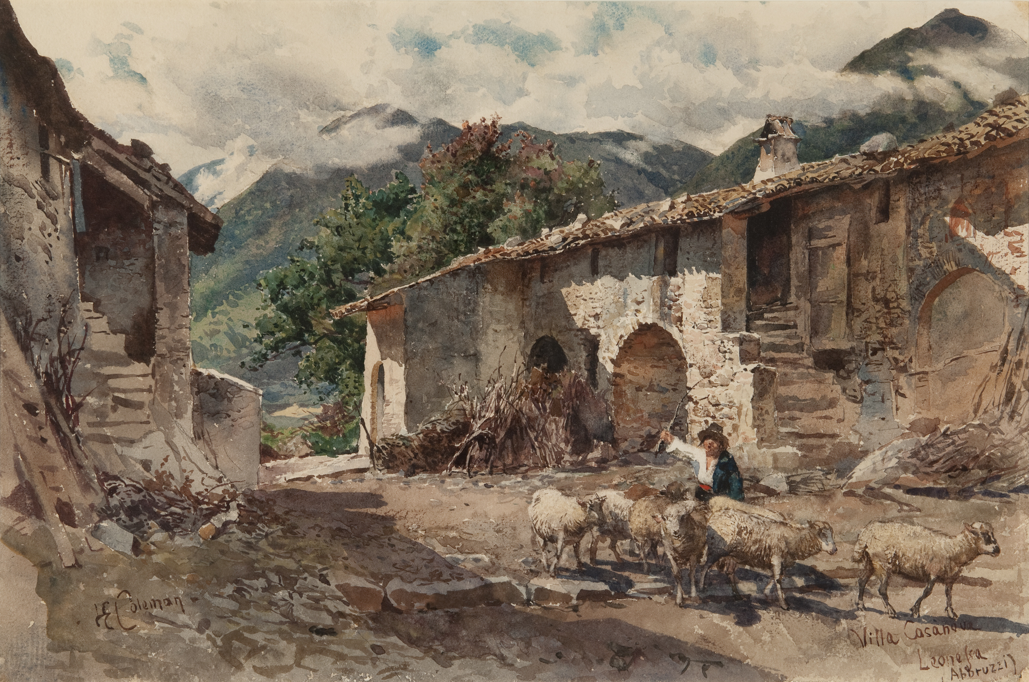 A shepherd with a flock of sheep amid old stone buildings in a mountain landscape.
