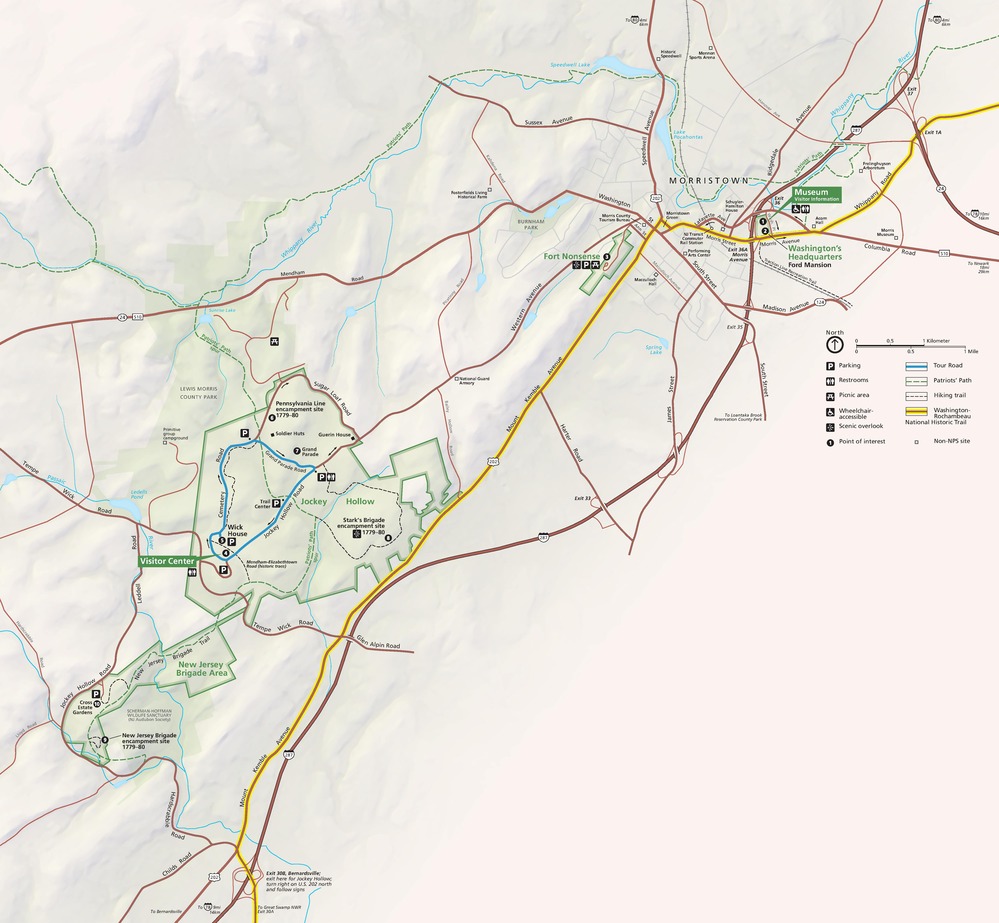 Map of Morristown National Historical Park in New Jersey. The smaller of the two park areas, both of which are shown in green, is in the northwest and the larger is in the southeast. Several roads run diagonally between ridges to connect the two parks. 
