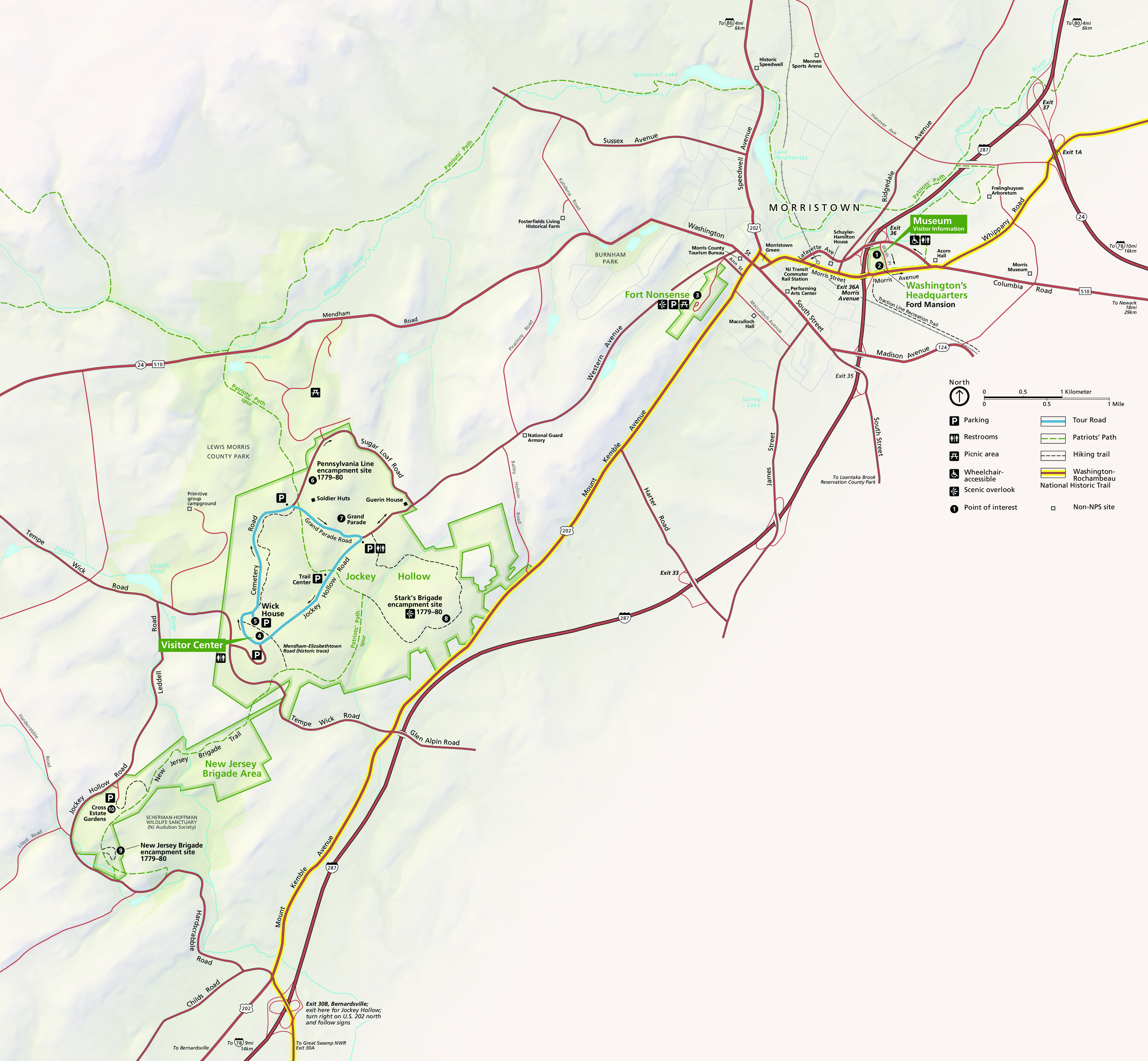Map of Morristown National Historical Park in New Jersey. The smaller of the two park areas, both of which are shown in green, is in the northwest and the larger is in the southeast. Several roads run diagonally between ridges to connect the two parks. 