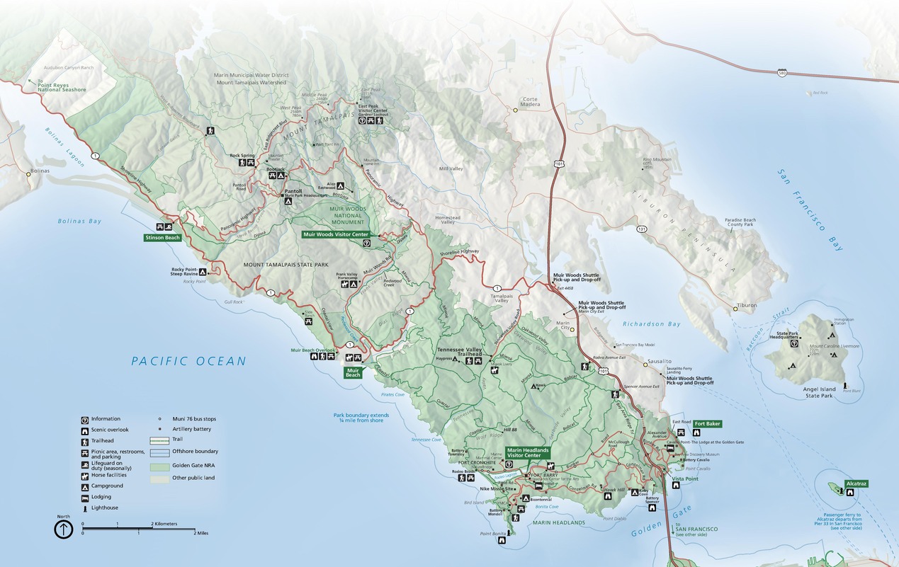 Map of the northern area of the Golden Gate National Recreation Area in California. The park is highlighted in greenwith the surrounding areas in tan. Red lines represent roads, and dotted green lies represent trails.