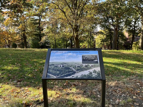 Wayside titled "Handsomely set with various forest-trees" overlooking a grassy lawn and trees.