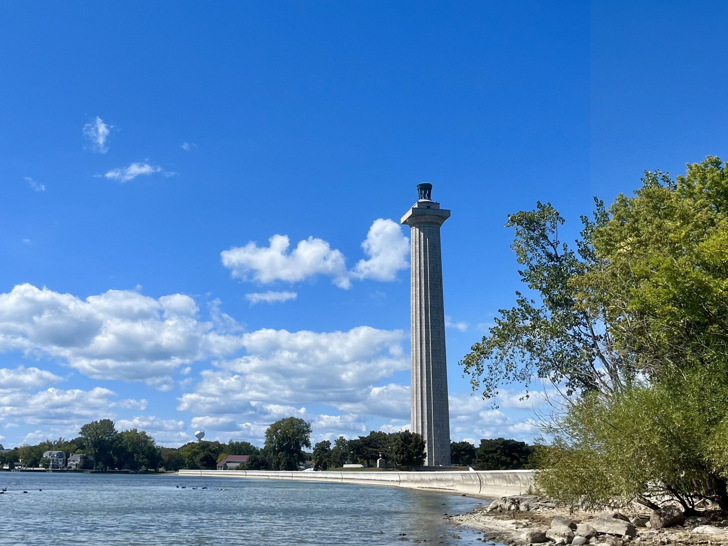 Tall Doric column near a lake