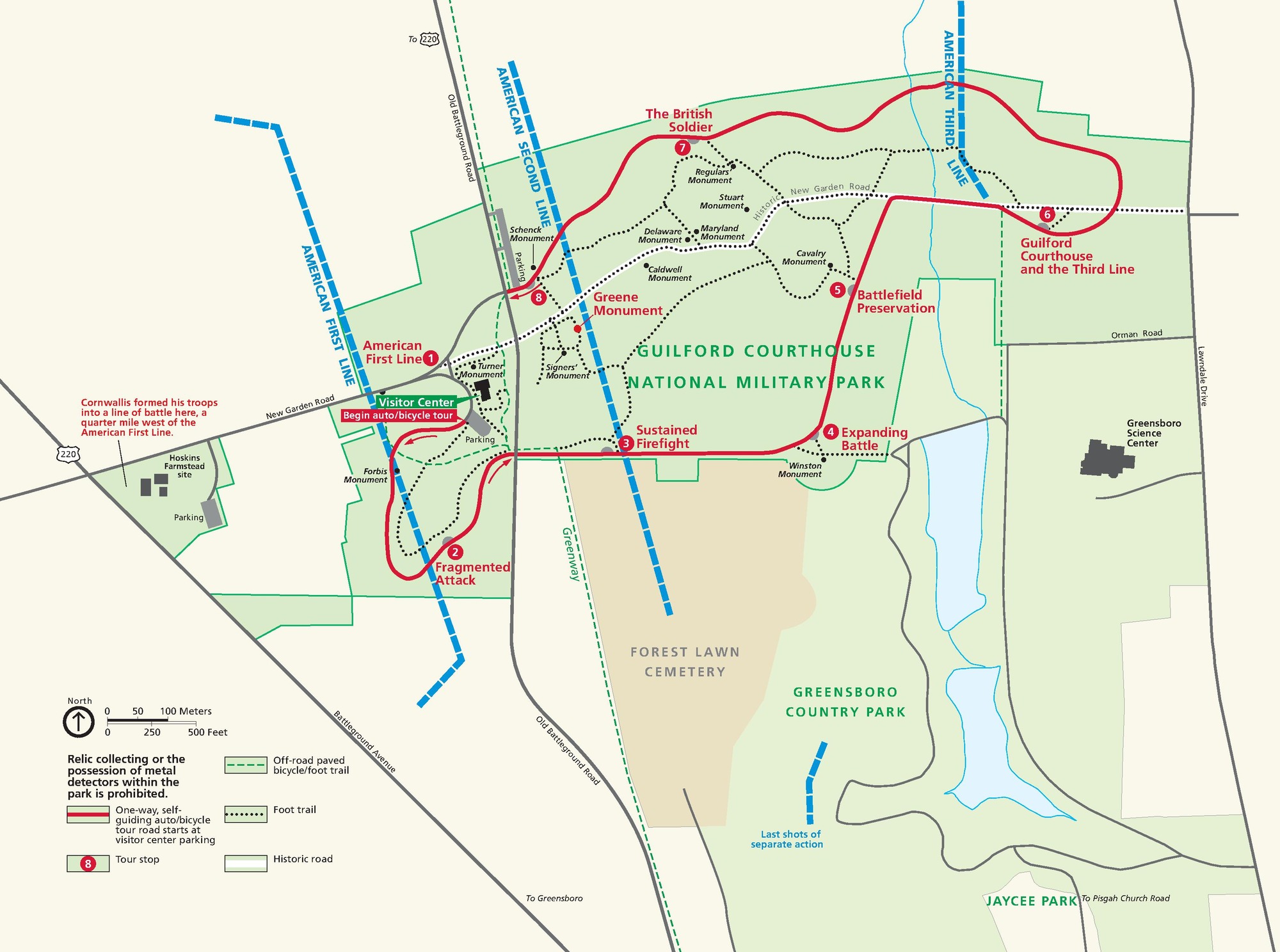 Map of Guilford Courthouse National Military Park in North Carolina. The park is shaded green with the neighboring Greensboro Country Park shown in lighter green and Forest Lawn Cemetery in tan. A self-guiding tour route represented in red passes eight numbered sites, and three blue dashed lines indicate lines of battle.