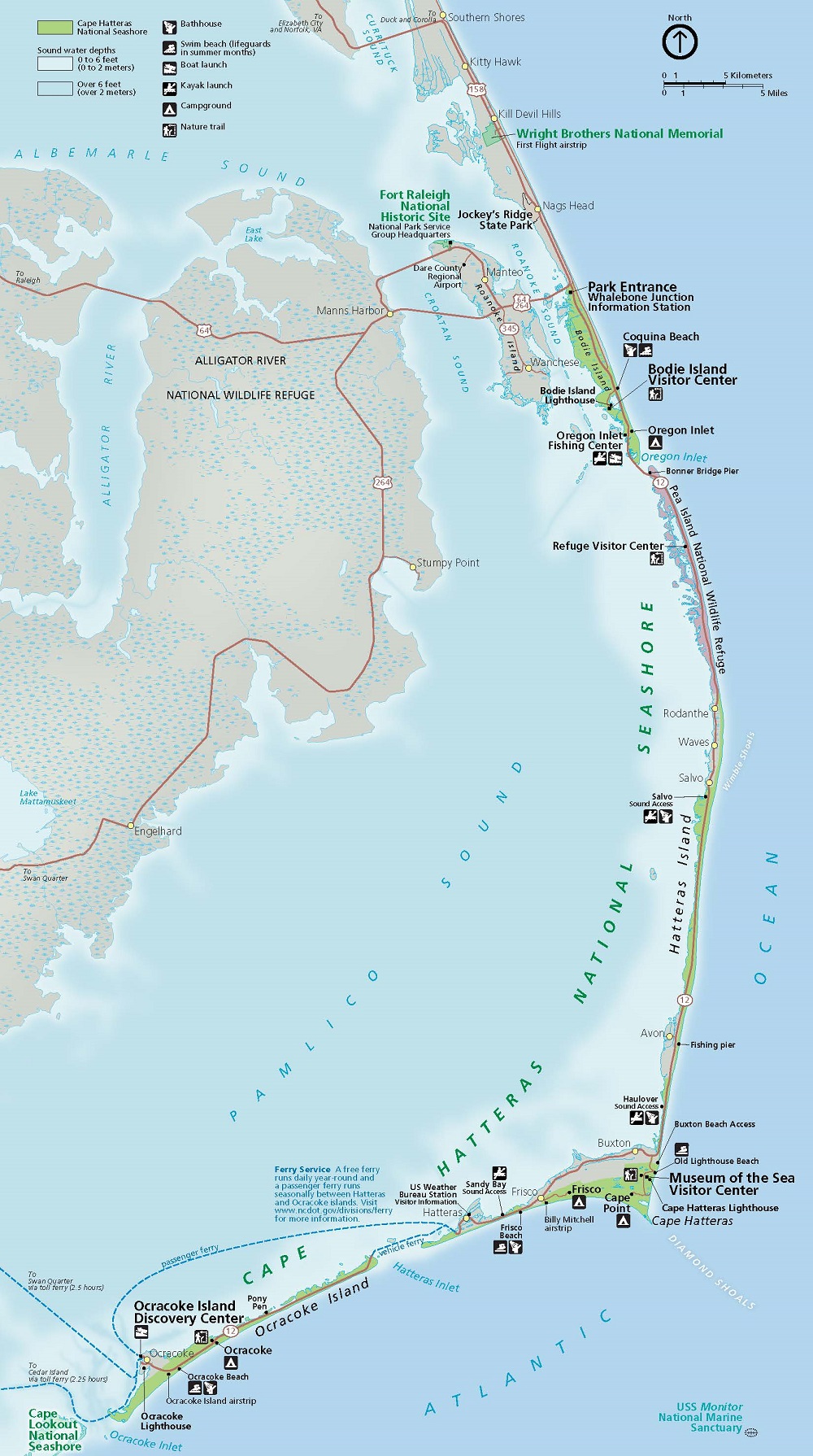 Map of Cape Hatteras National Seashore in North Carolina. A string of islands, parks, and refuges enclose a series of sounds, which in turn curve around Alligator River National Wildlife Refuge. The refuge is shaded with blue diamonds on tan. Parks are shown in green, and water is represented in blue.