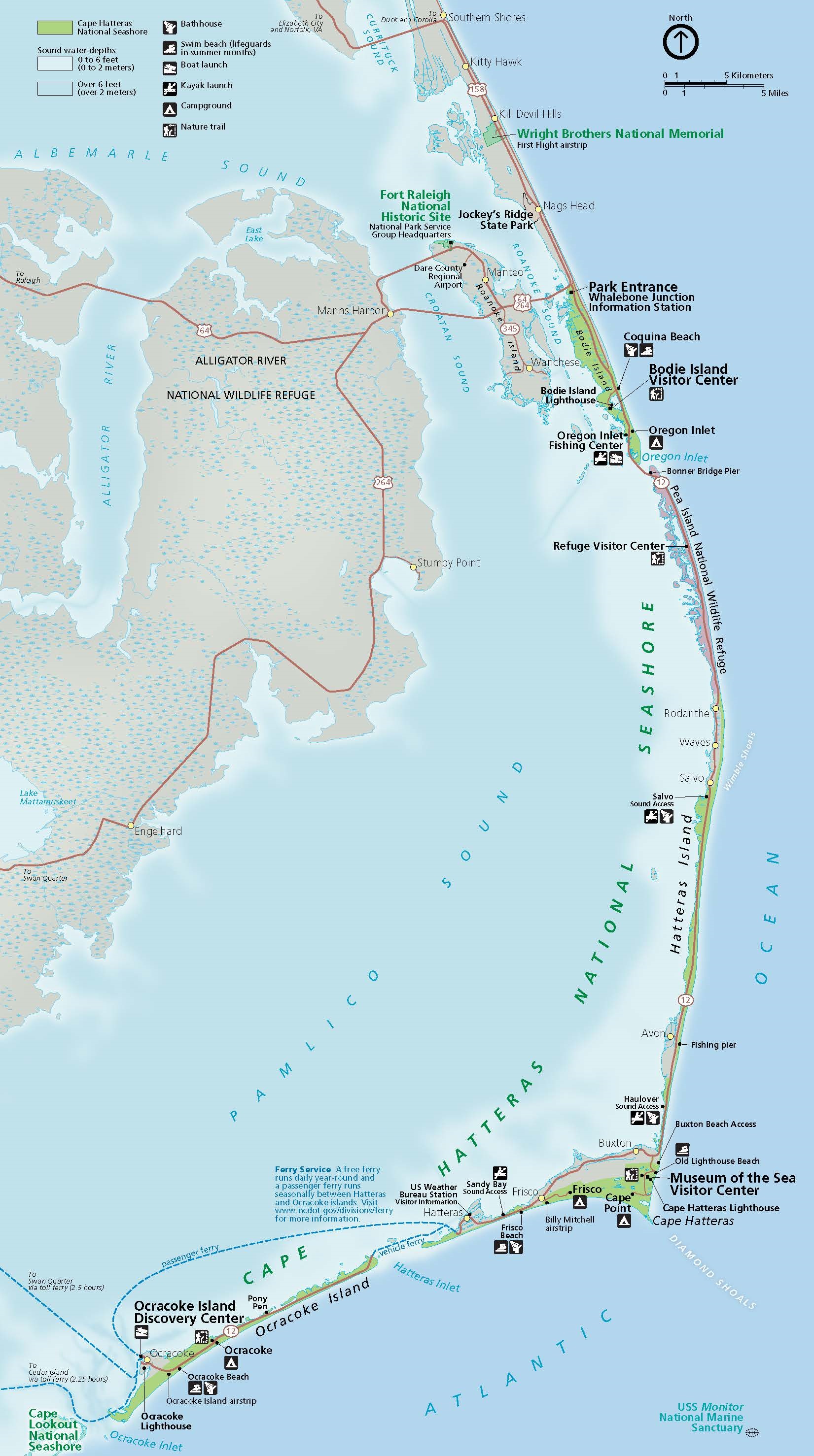 Map of Cape Hatteras National Seashore in North Carolina. A string of islands, parks, and refuges enclose a series of sounds, which in turn curve around Alligator River National Wildlife Refuge. The refuge is shaded with blue diamonds on tan. Parks are shown in green, and water is represented in blue.