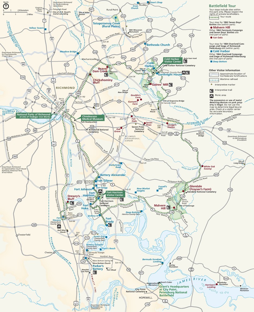 Map of Richmond National Battlefield Park in Virginia. A web of gray roadways spreads on off-white lands from Richmond to reach sites marked by green callout boxes, red dots, and blue squares.