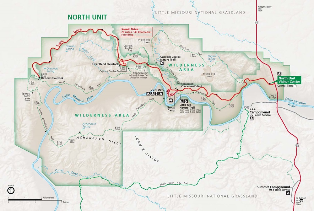 Map of the North Unit of Theodore Roosevelt National Park in North Dakota. A Scenic Drive, indicated in red, and the Little Missouri River in blue ripple through the park to the north, which is bounded by a green line. 