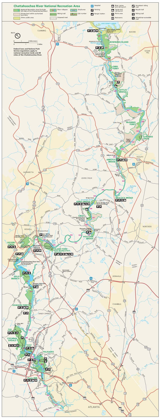 Map of Chattahoochee River National Recreation Area in Georgia, which reaches from Bowmans Island at the top right and Marietta Boulevard in Atlanta at the bottom left. The park is shown in green, bordering areas of public land in yellow and off-white, the Chattahoochee River, and other waterways in blue, and private land in tan.