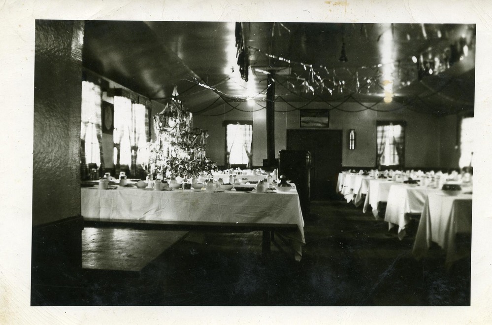 Tables set with table clothes and dishes