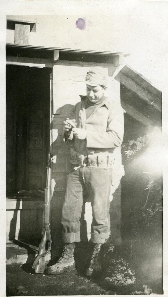 Man posing by a building