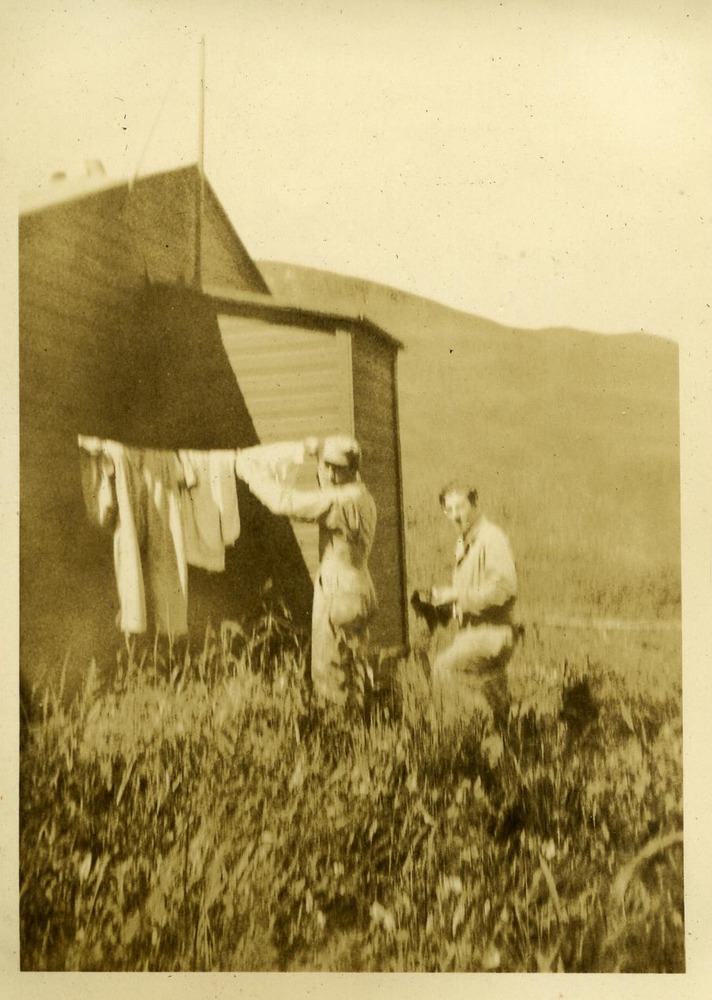 Two men and laundry