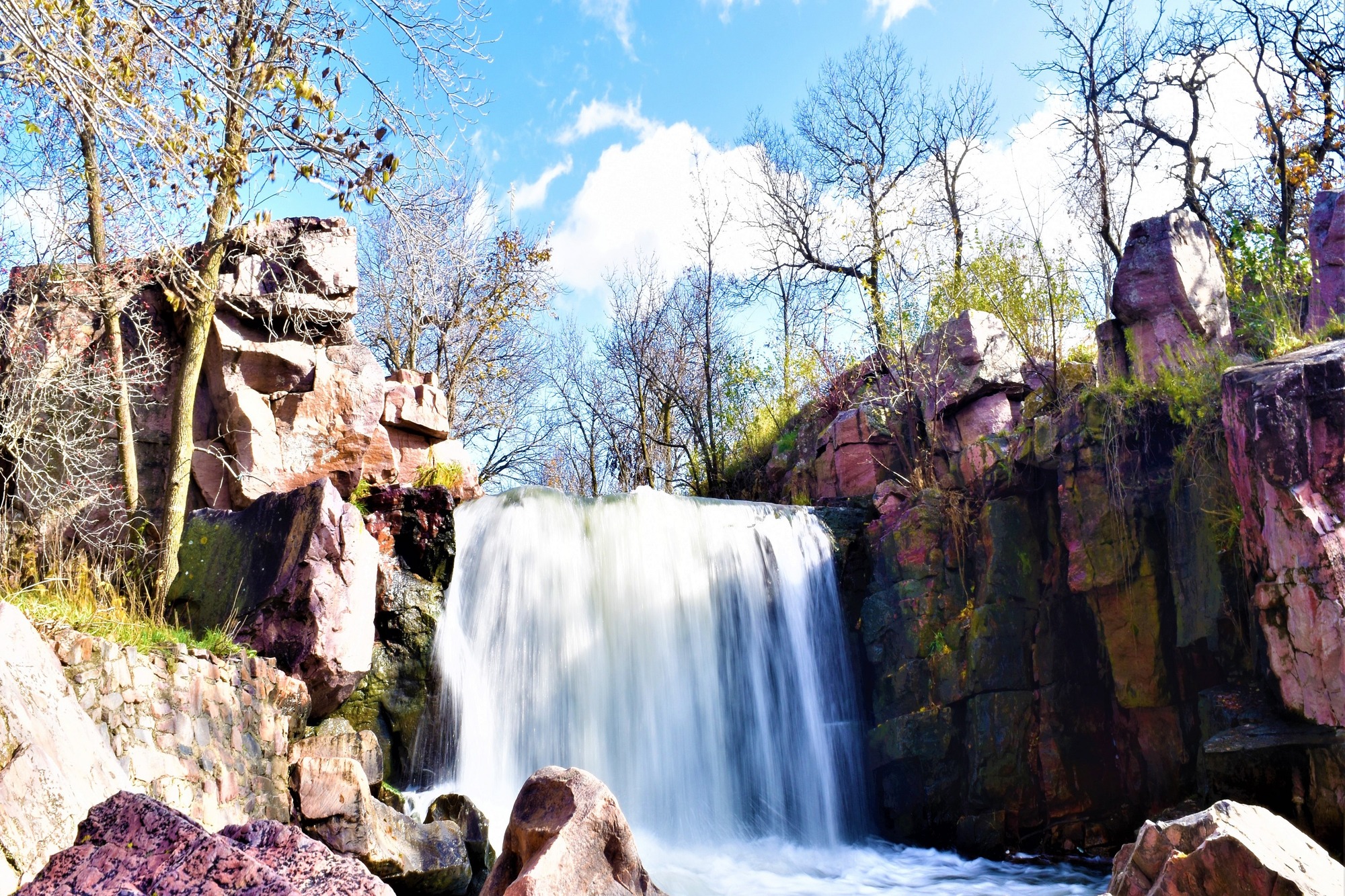 Waterfall running powerfully on a sunny day