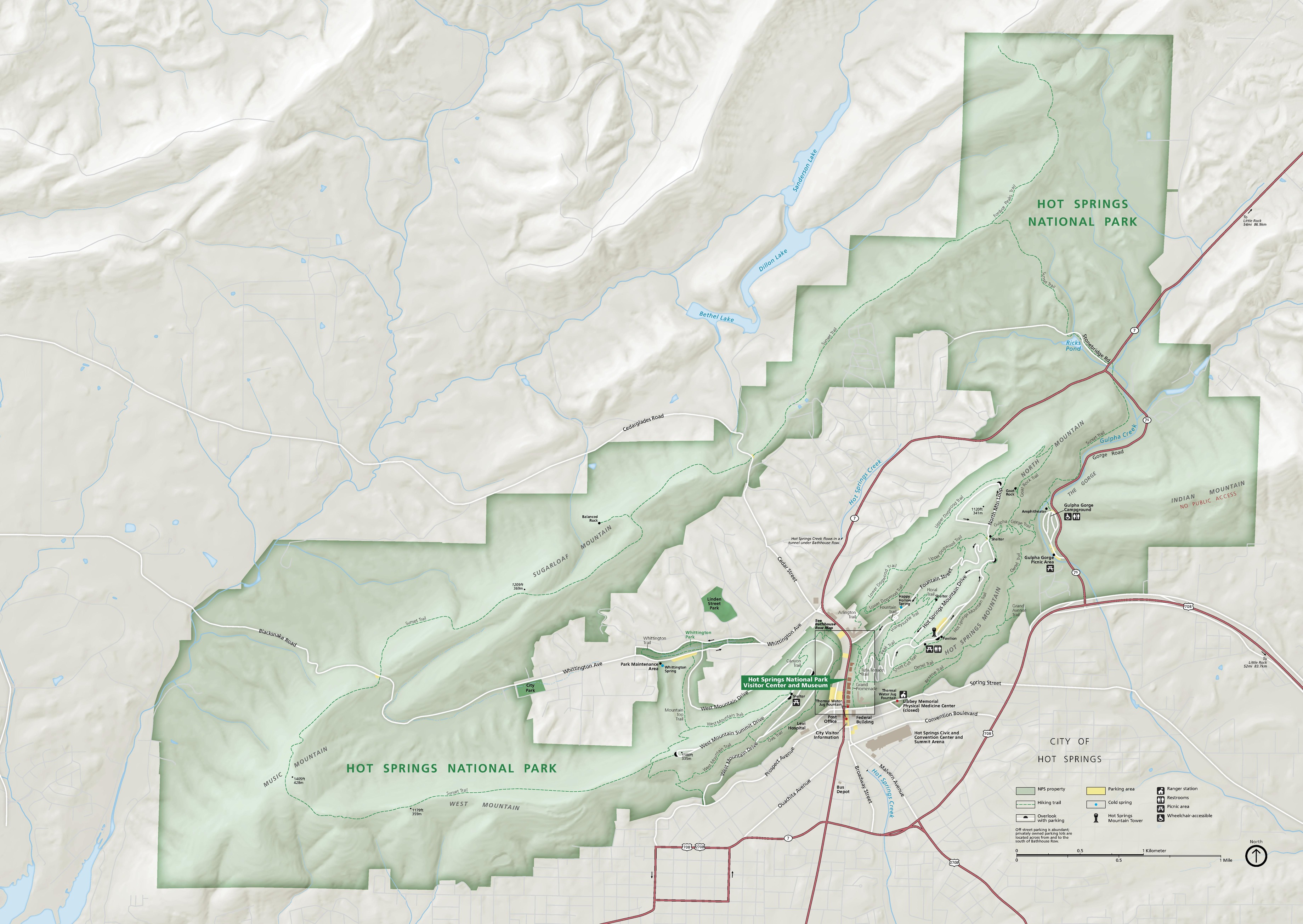 Map of Hot Springs National Park in Arkansas. The irregularly-shaped green area of the park stretches across the otherwise opalescent-white region from the bottom left to the top right corners of the map.