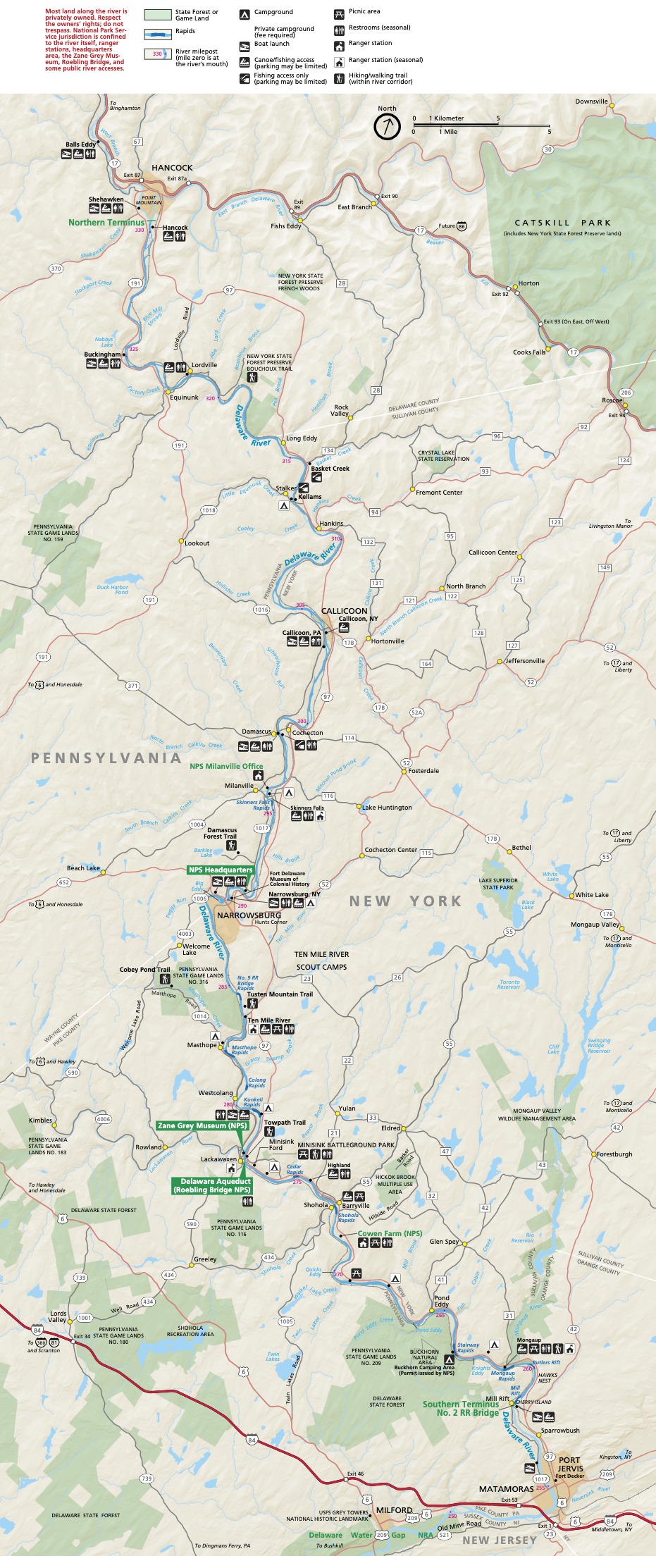 Map of the Upper Delaware Scenic and Recreational River, beginning near Hancock, New York, and ending near Port Jervis, New York. Campgrounds, Picnic Areas, Trails, Fishing Areas, and other features sit close to the river, and more than a dozen state forests and game lands, shown in green, are strewn about the long and narrow map.