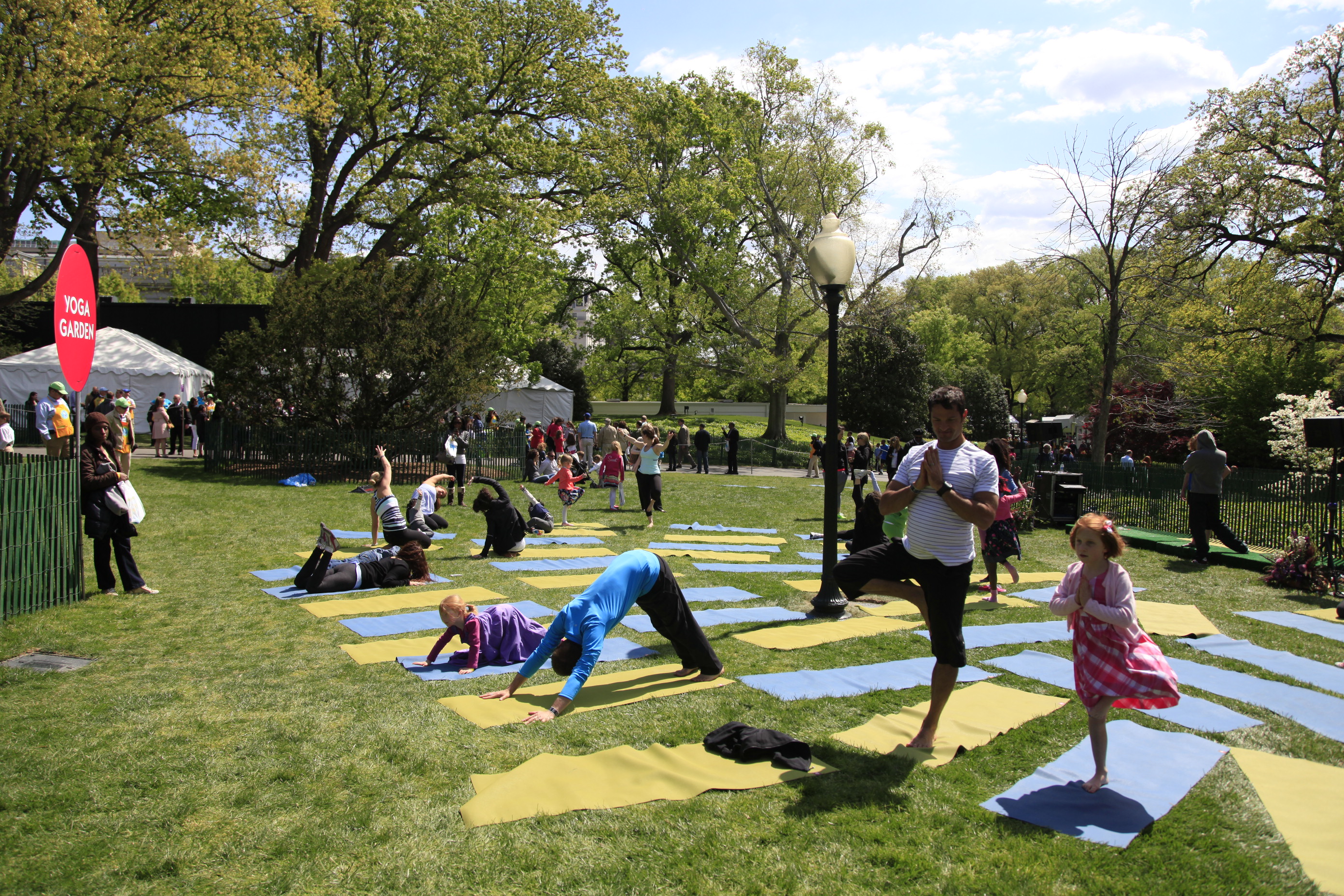 Children learn yoga poses at the 2012 Easter Egg Roll.
