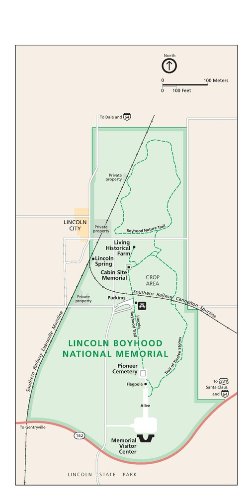 Map of the Lincoln Boyhood National Memorial in Indiana. The park is shown in green, surrounding areas in tan, roads in red or white, and the town of Lincoln City in yellow.