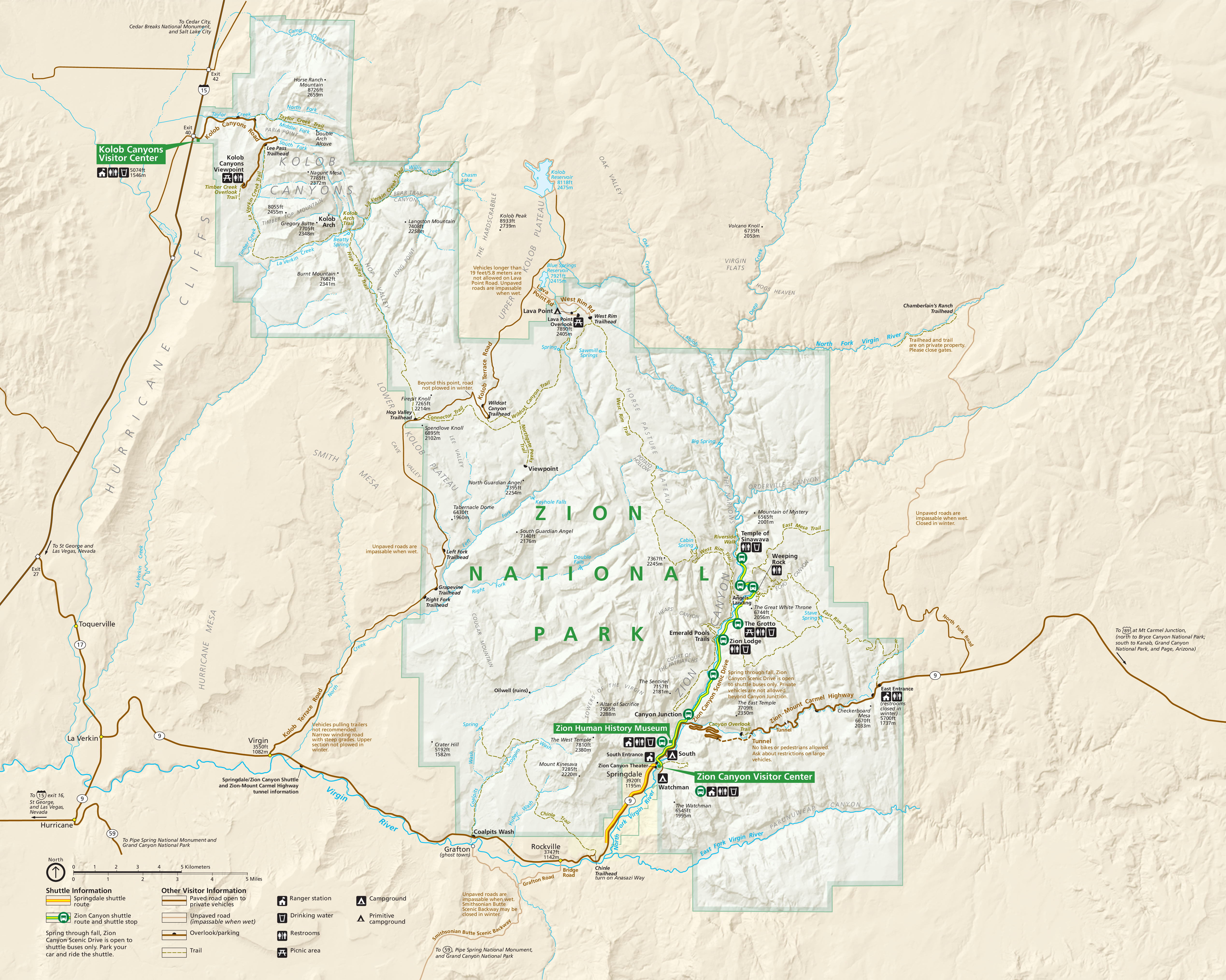 Map of Zion National Park in Utah. The park is made up of two roughly square sections connected at the northwest corner. Boundaries are shaded green, and terrain in the park is white. Surrounding areas are tan.