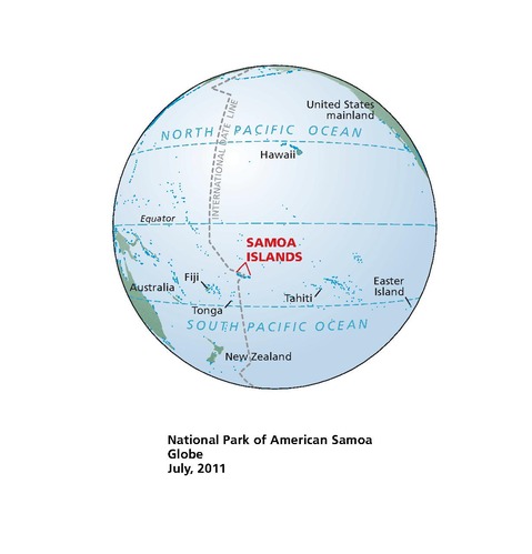 Locator globe for National Park of American Samoa is dated July 2011. Blue ocean waters cover the sphere, which is scattered with specks of blue and patches of green land.