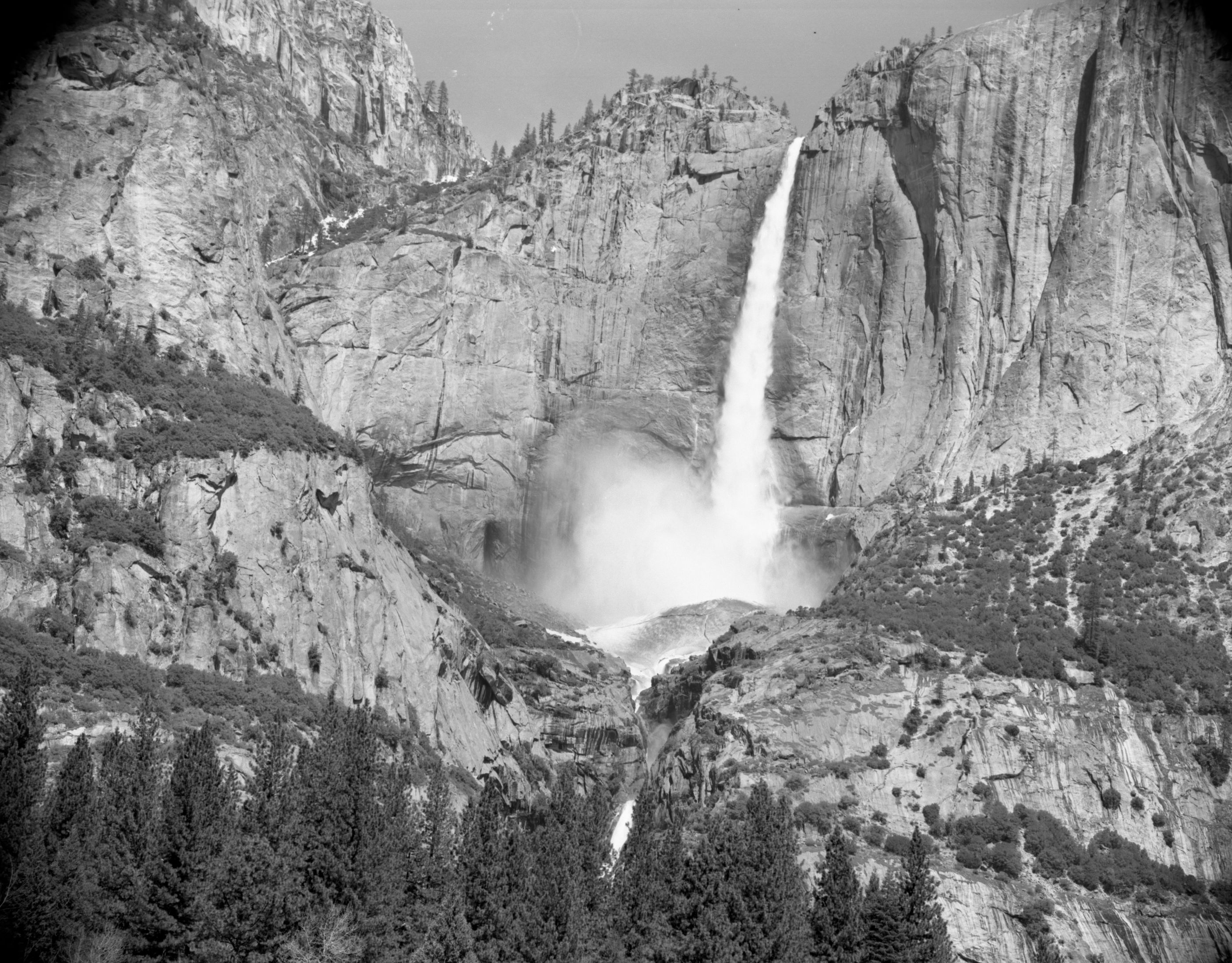 Yosemite Falls: Upper fall from road side west of Chapel. Record of snow cone demise.