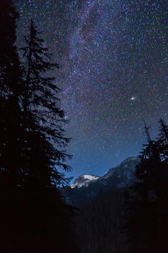 The Milky Way Arcs above Peaks - ©Andy Porter