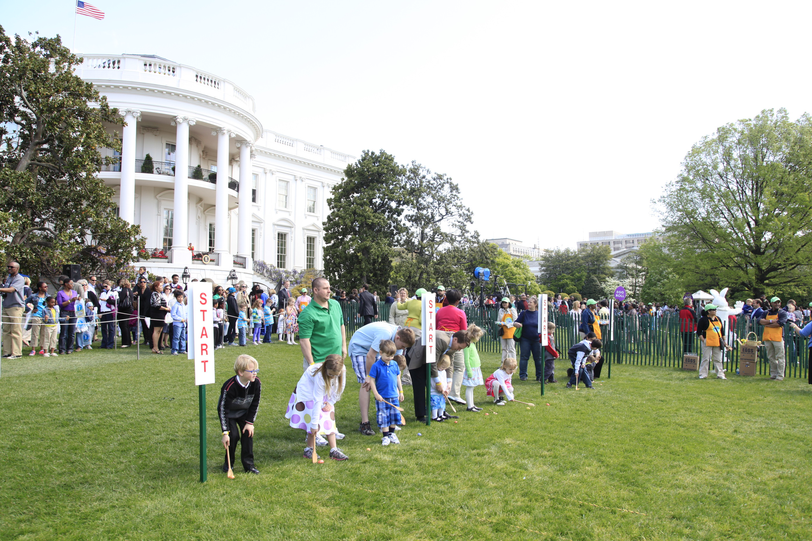 A young girl and her mom participate in the Egg Roll.