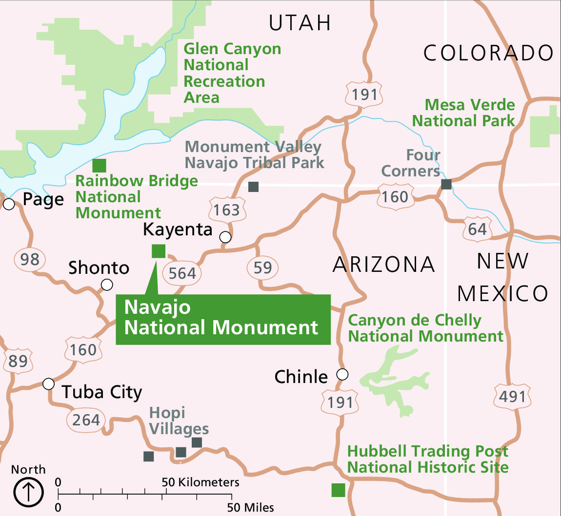 Map of the area around Navajo National Monument in Arizona. Most of the Four Corners region is tan-colored, with about a dozen parks, monuments, and sites marked in green. Brown roads create a web across the map.