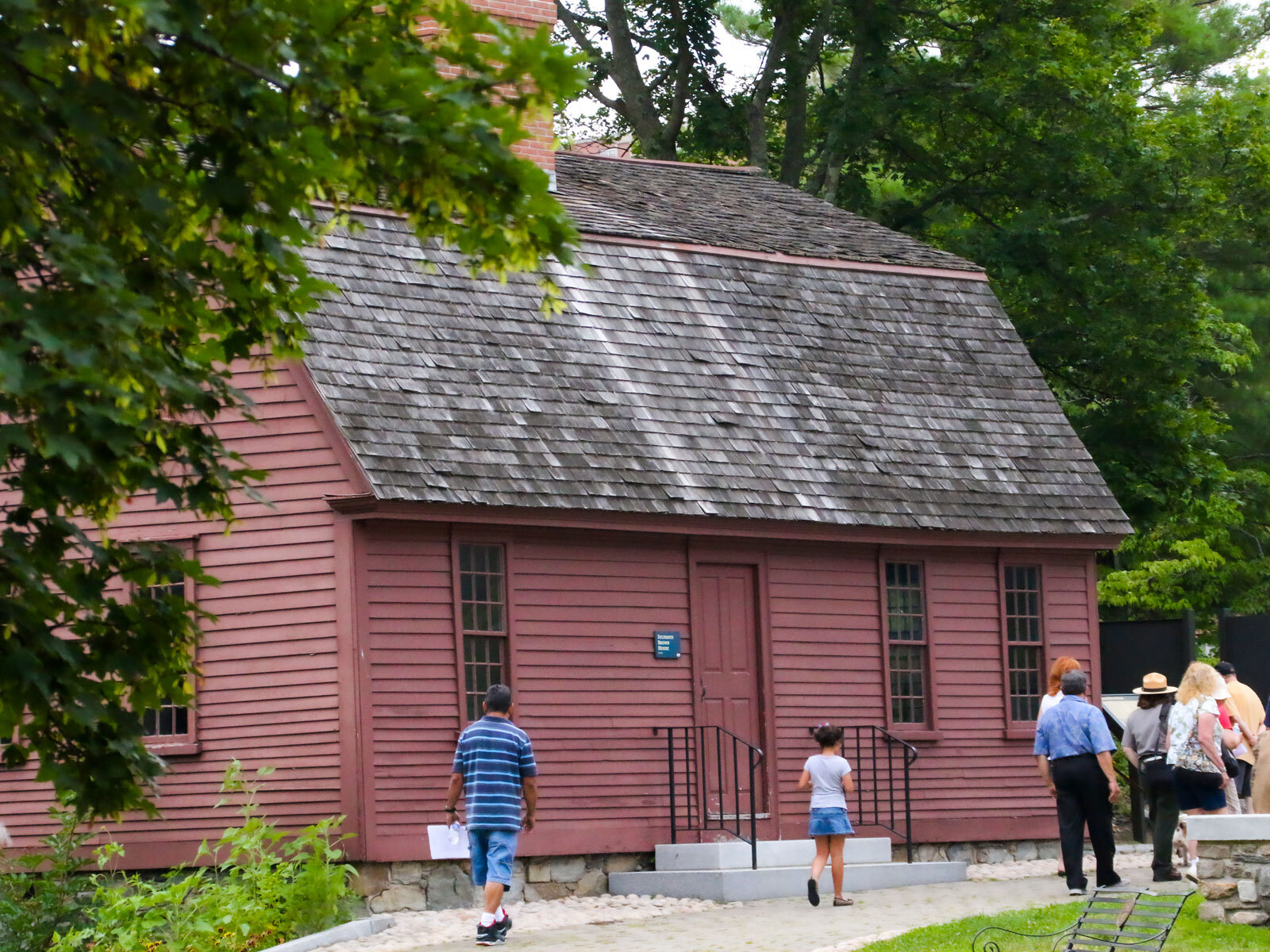 Visitors walking past the Sylvanus Brown House | Massachusetts National Parks