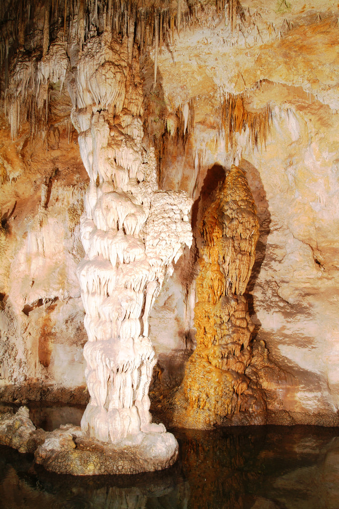 The Devil's Spring column surrounded by a cave pool.
