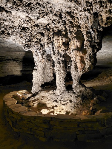 Large stone pillars in the cave passage. 
