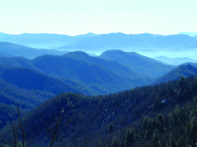 mountain ranges and misty valleys