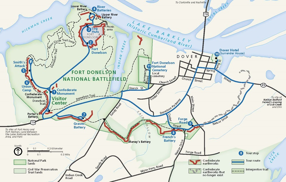 Map of Fort Donelson National Battlefield in Kentucky. The park area, shown in green, sits at a point between a creek and a lake, with other park areas in the nearby town of Dover. Waters are blue, Civil War Preservation Trust land is shaded mint green, and other land is beige.